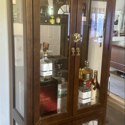 Glass cabinet  (BOTTLES NOT INCLUDED )