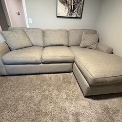 Grey sectional available for sale - soft and comfy!