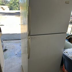 Free small garage fridge