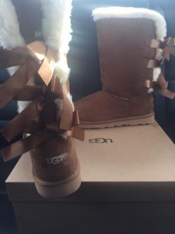 Women UGG BOOTS, colors black & chestnut limited sizes asking $90.00, serious inquiries only.