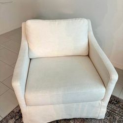 Slipcover sloped arm swivel chair