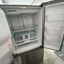 Gray 2 door Whirlpool  with ice maker and water 