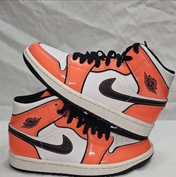 These are the Nike Air Jordan 1 Mid SE Turf Orange. sneakers