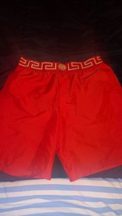 LIKE NEW RED VERSACE BORADSHORTS