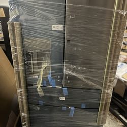 Brand New Stainless Steel G E Profile Four Door  Fridge