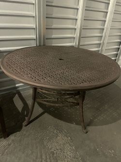 Excellent condition outdoor wrought iron dinning table