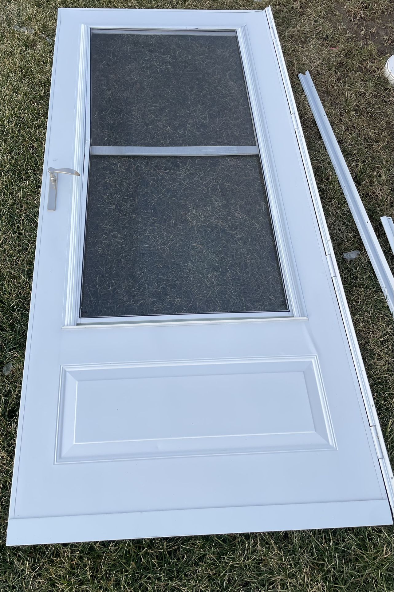 EMCO 300 Series 36 in. x 80 in. White Universal Triple-Track Storm Door