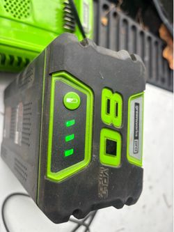 Green works 80 V battery and charger and EGO 56 V charger DeWalt 20 V charger Ryobi 40 V charger