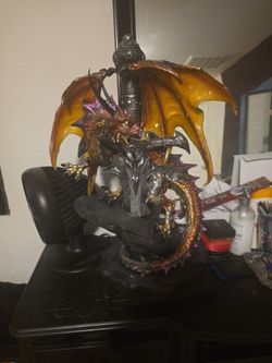 Dragon statue with sword