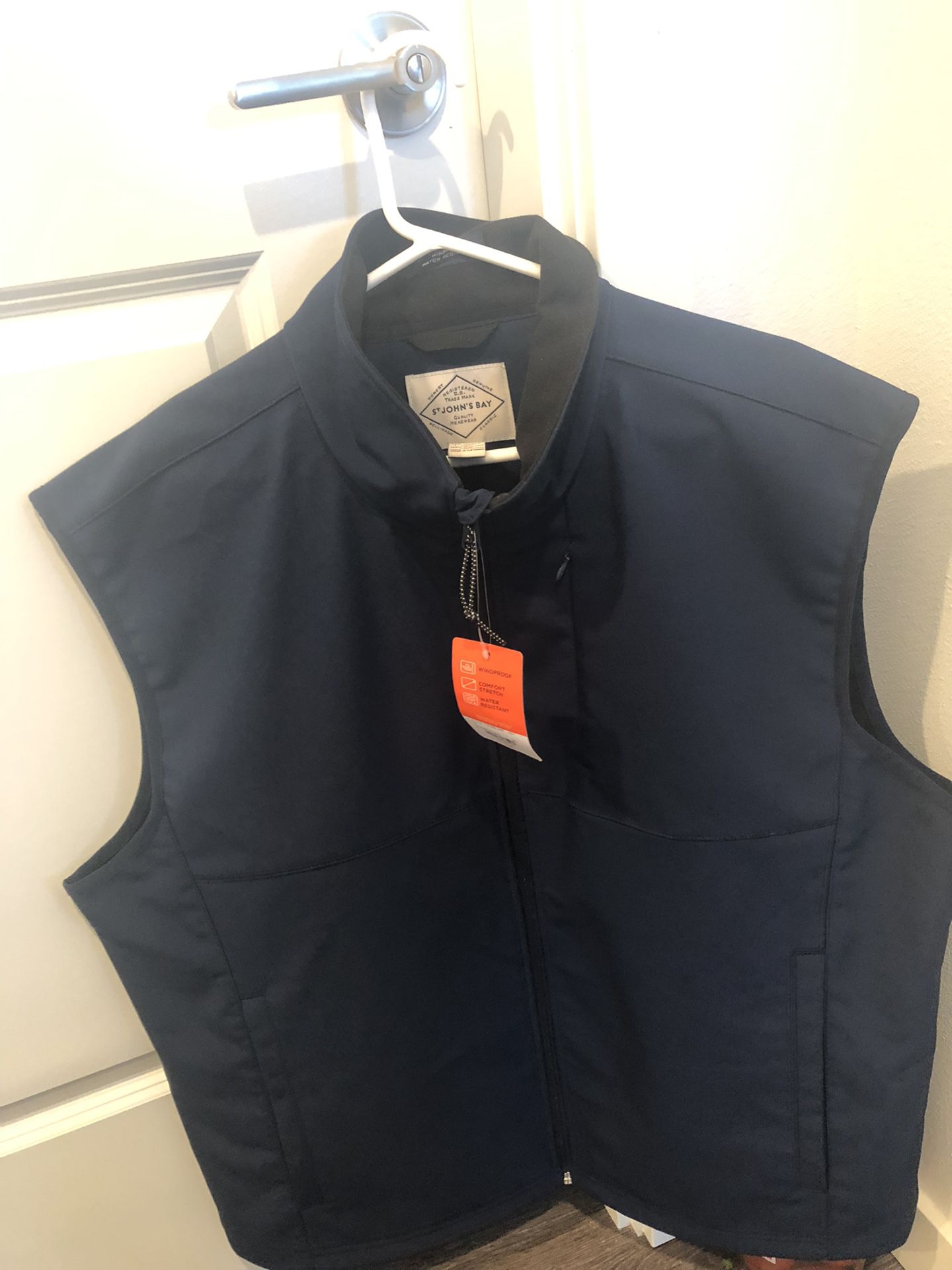 New, men's, water-repellent vest, size XL