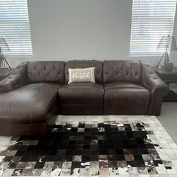 Leather Recliner With A Little Wear And Tear
