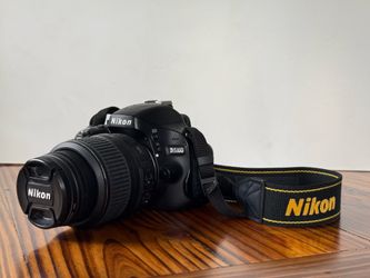 Nikon D5100 DSLR camera with kit lens