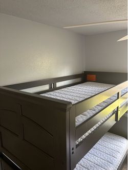 Twin size beds that can connect into a bunk bed
