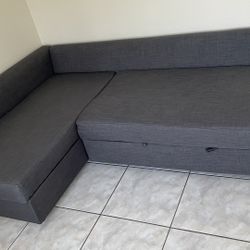 FRIHETEN Sleeper sectional,3 seat w/storage, dark gray