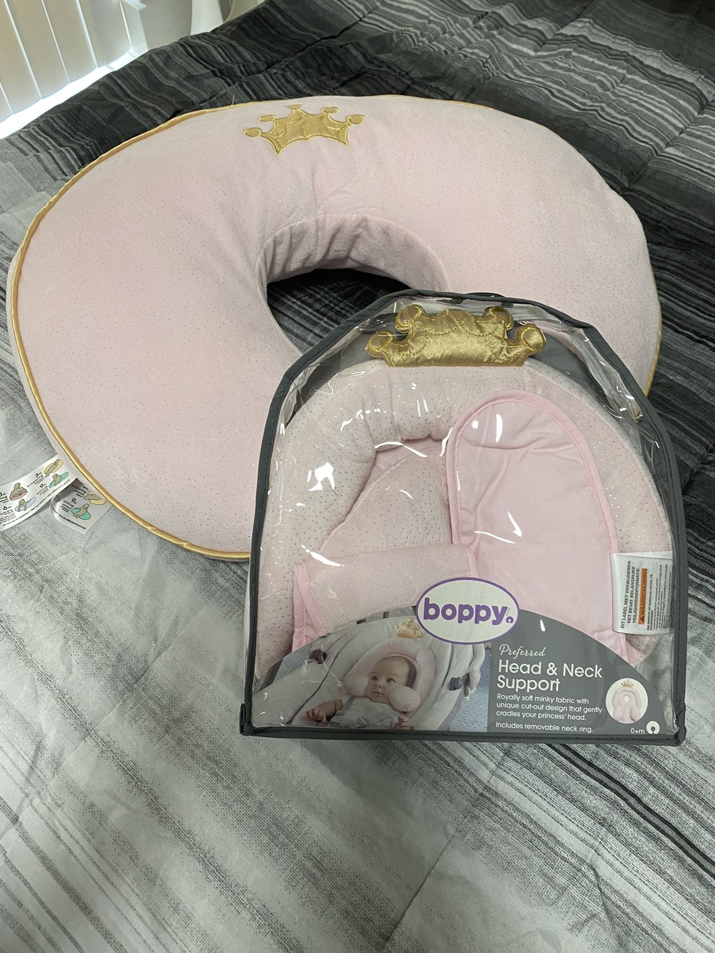 Boppy Nursing Pillow And Head and neck support in pink