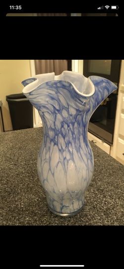 Blue and white ruffled vase