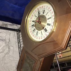 Antique wall grandfather clock. $150. Needs servicing