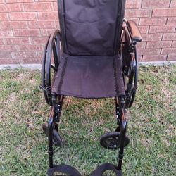 Wheelchair/Silla de Ruedas 