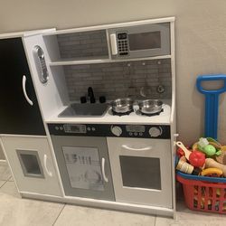 Kitchen w/ basket of play food
