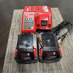 2 Milwaukee M18 XC5.0 battery and  charger new