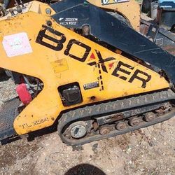 Boxer Mini Tractor  the bucket is 36 inches new hoses new hydraulics new tires