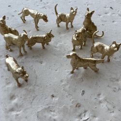 Small gold cat and dog figurines 