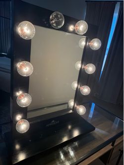 Black impressions vanity mirror.
