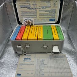 Metal first aid kit vintage North Branded w paper- sealed bandage boxes