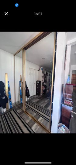 Sliding mirror closet door