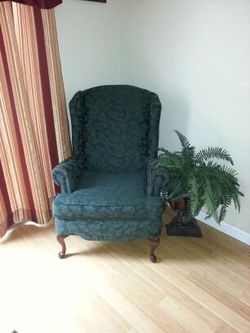 Price reduced nice green acent chair