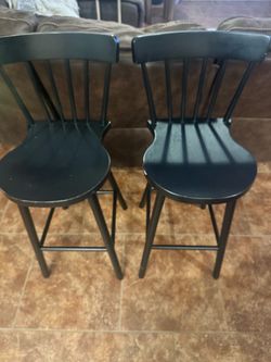 2 black counter stools