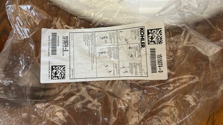 New Kohler Toilet Seat with screws
