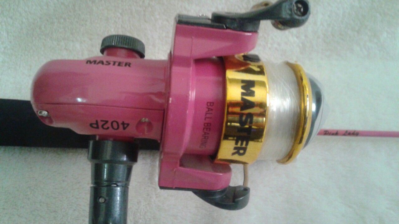 Pink Lady, 24" rod and reel. Fishing pole