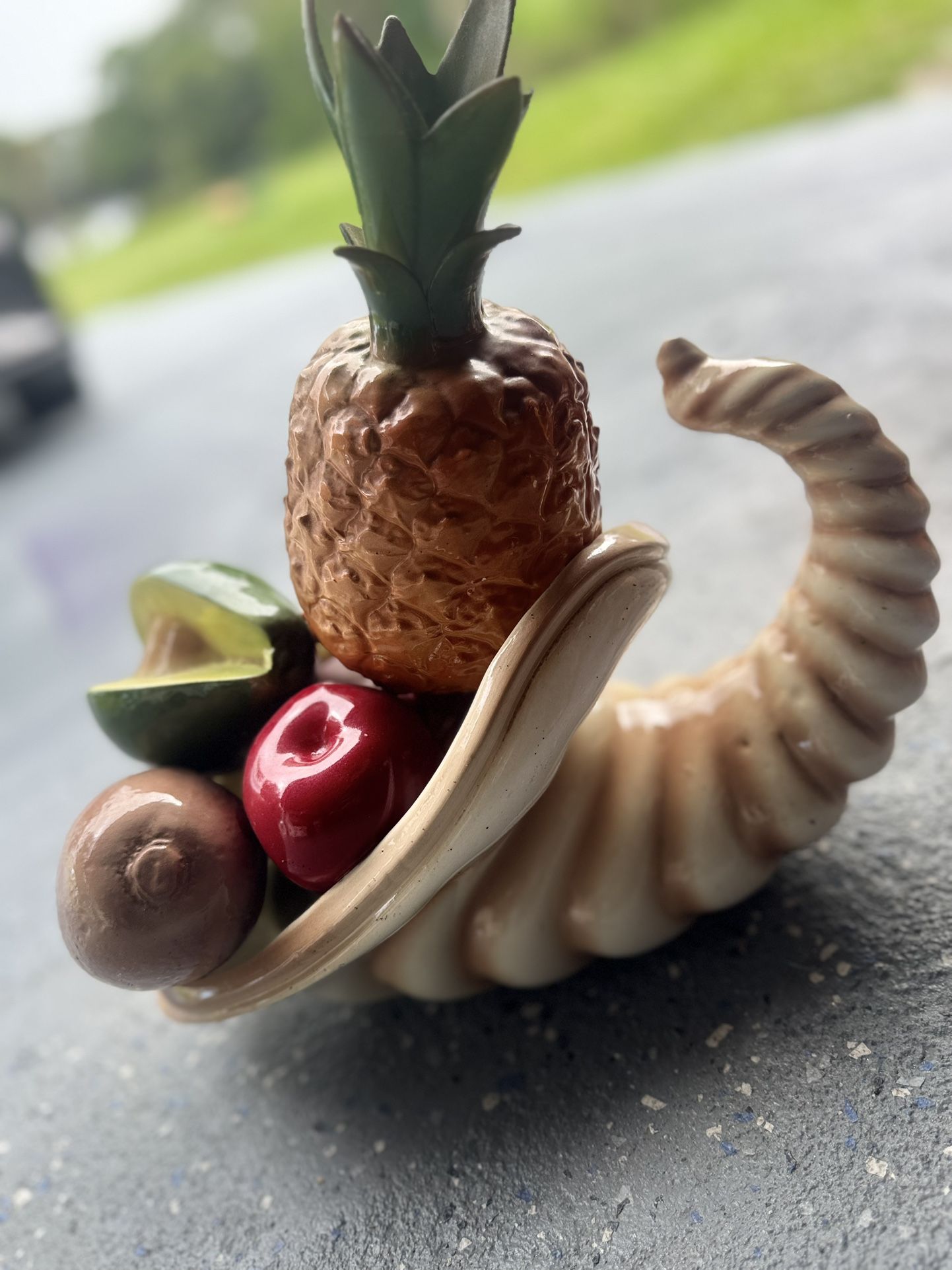 Ceramic Cornucopia With Fruit. Has apples, pears, banana, orange fruits