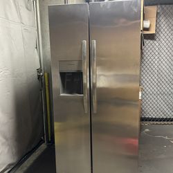 Refrigerator. Frigidaire Stain less Steel Side-by-Side Refrigerator – Like New