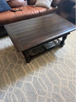 Dark brown wood coffee table