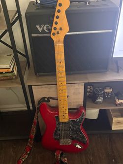 Guitar and vox amp combo