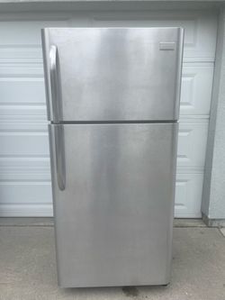 Frigidaire top and bottom refrigerator for $180. Dimensions are 30Wx30Dx66H. Pick up only.
