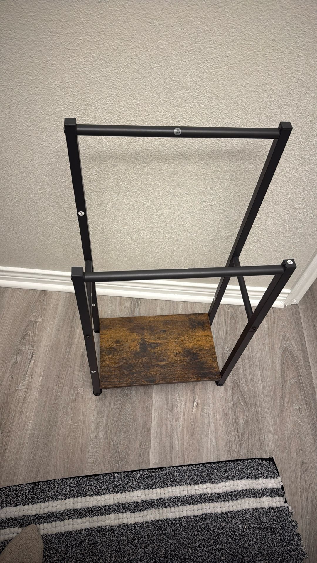 Bathroom rack for towels and the like