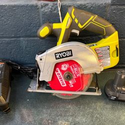 Ryobi saw with laser battery  and charger