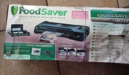 Food Saver in tattered box.. machine only used 2x works great
