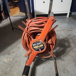 Portable cord reel w/ extension cords