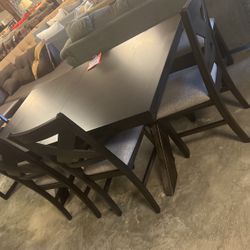 Brand new table and four chairs 1199 grab and go hurry limited quantities