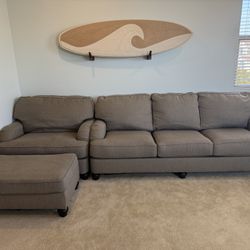 Couch with chaise/ oversized chair and ottoman.