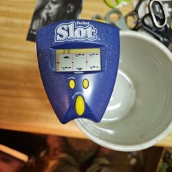 Radica Pocket Slots Slot Machine - Electronic Handheld Game 