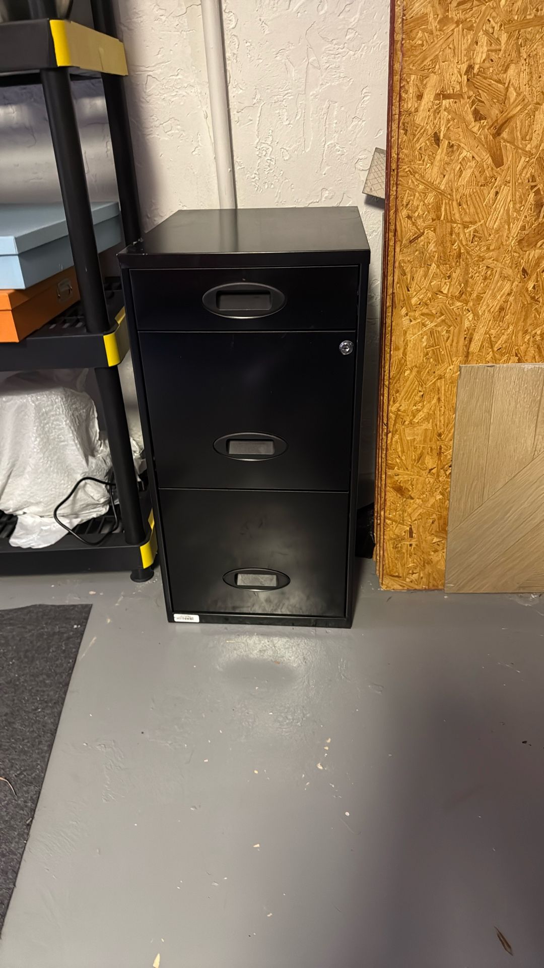 Three drawer file cabinet