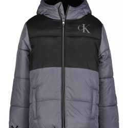 Calvin Klein Jeans boys' grey and black color blocked hooded puffer jacket with a fleece lining and ribbed cuffs. 