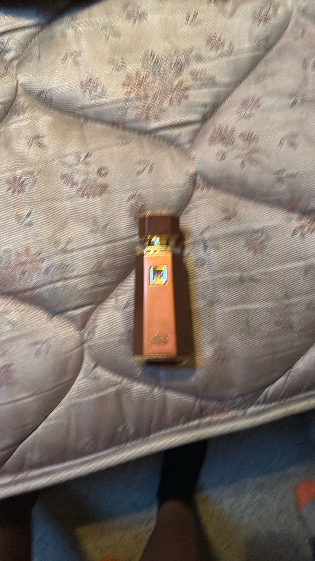 Liquid brown cologne