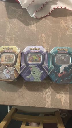 3 Pokemon tins