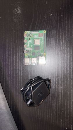 Raspberry Pi 4 Model B/1GB w/ 64 GB Sandisk micro sd-card & official Rpi4 15W charger